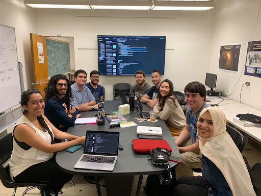 group of physics students excited for their meeting